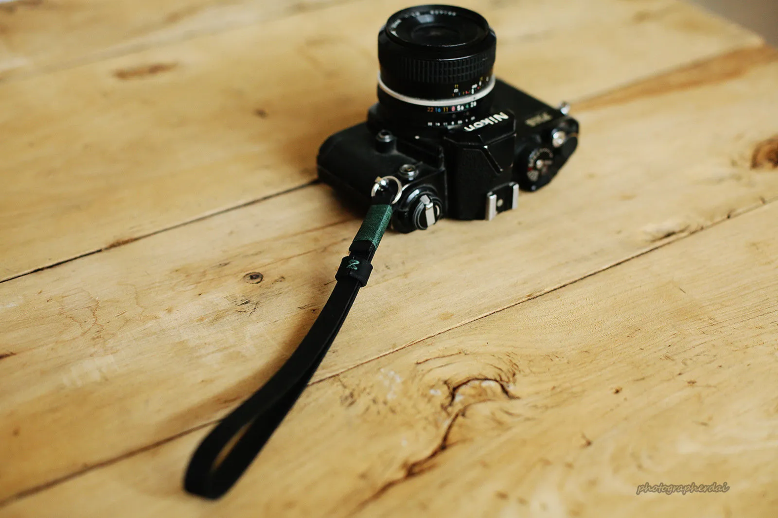 Black leather handmade camera wrist band strap dark green | Windmup.com Teen Friendly Gym
